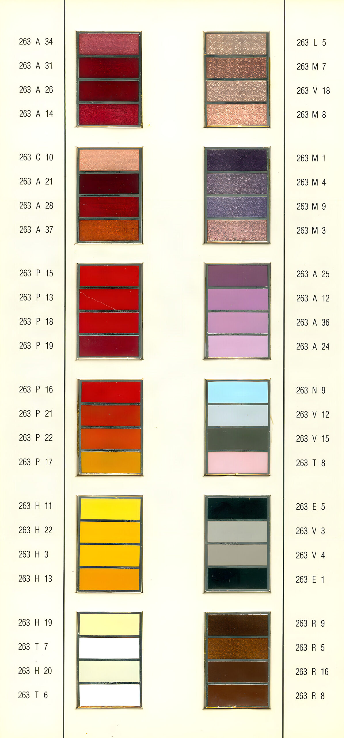 Blythe vitreous enamel color chart from the 1990s Johnson Matthey era: fired sample chips of transparent colors on textured backgrounds and opaque colors on solid backgrounds, each with its H-number