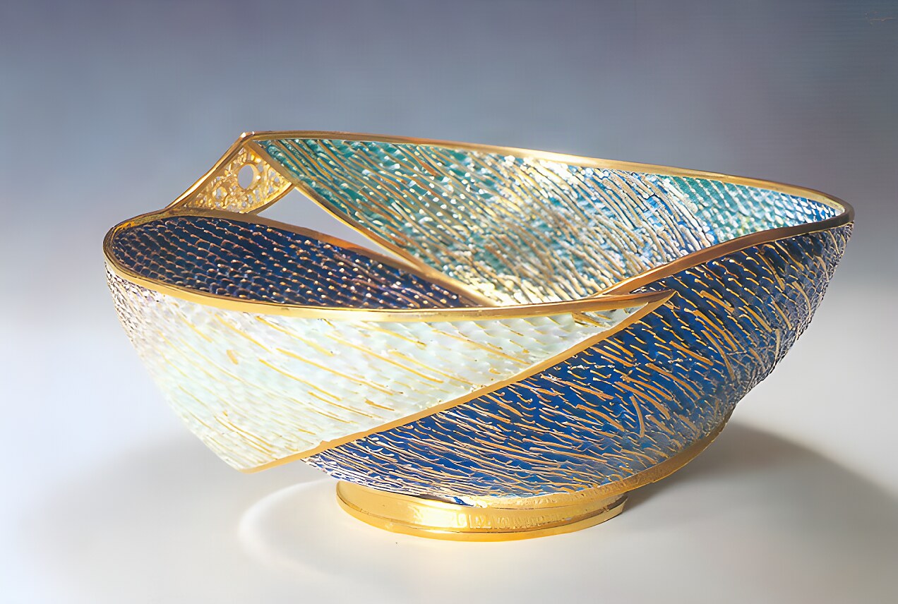 Plique-a-jour enamel bowl: translucent blue, turquoise and white enamel held in an open gold wire framework with no metal backing, so light passes through like stained glass